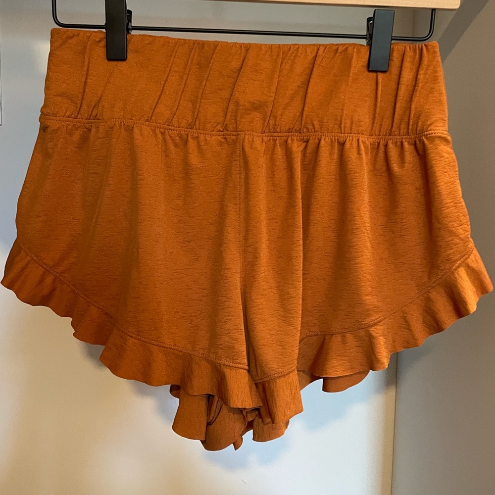 Free People Movement Featherweight Layering Shorts in Orange